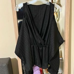 Women’s black silky open sleeve top